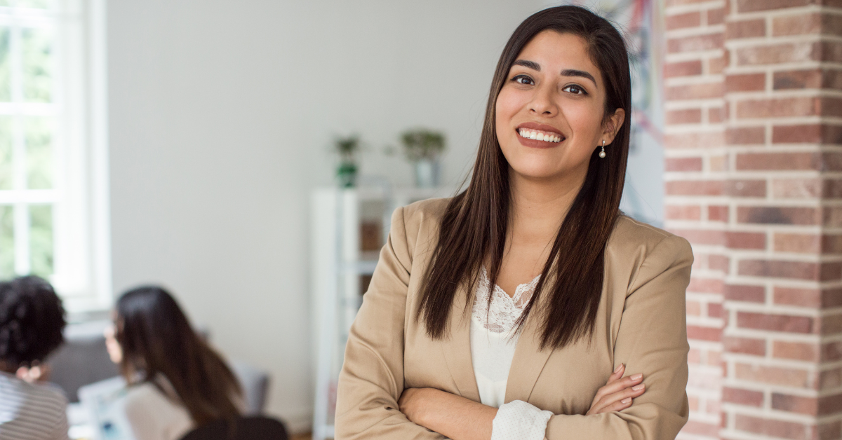 A confident professional woman in a white blazer represents expertise in OnlyFans taxes and financial advice.