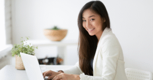 A woman organizing finances for cam models OnlyFans